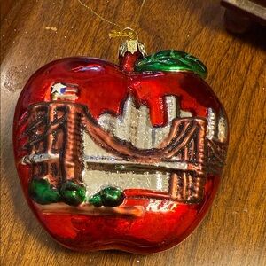 Red Apple Holiday Ornament with Cityscape Design